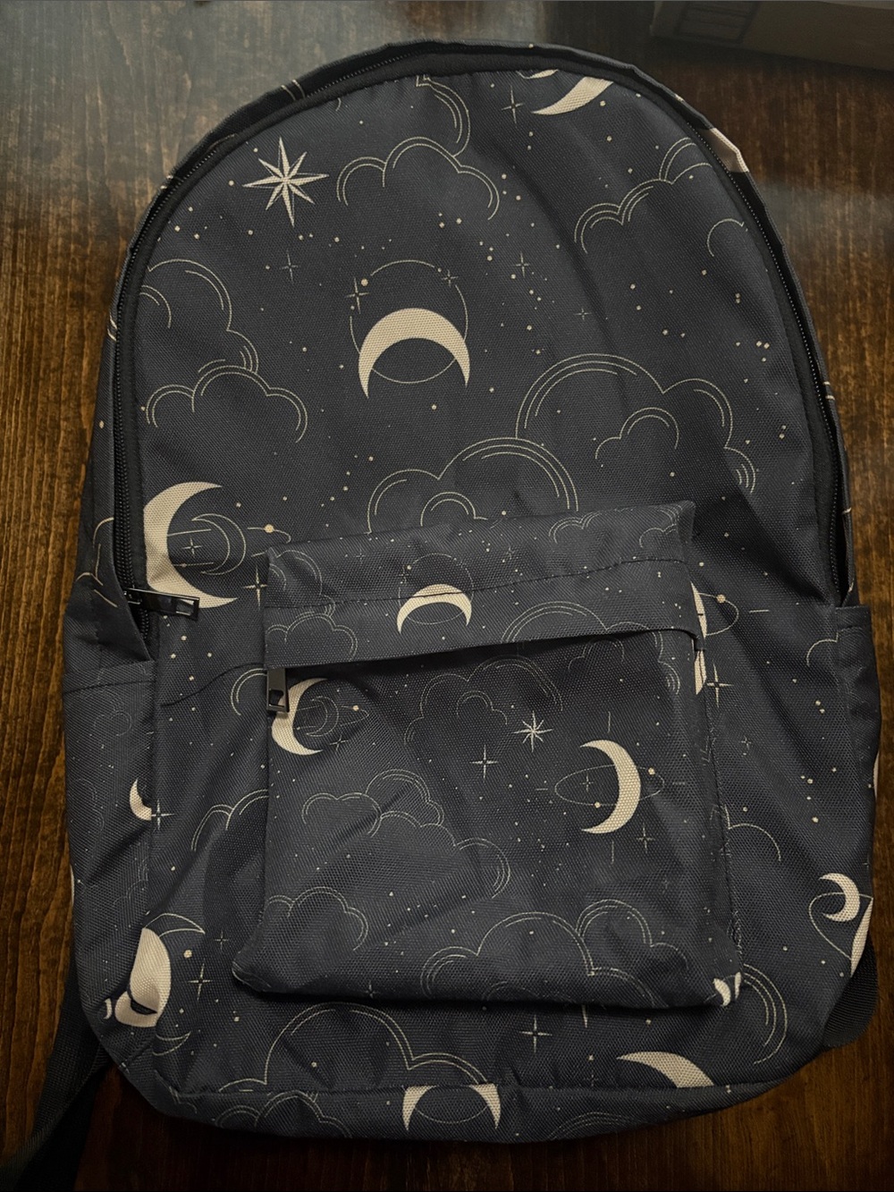 Moon, star & Cloud Print Backpack in black and Cream